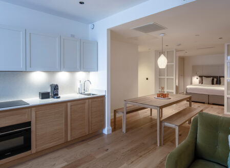 Deluxe One-Bedroom Kitchen and Dining Area